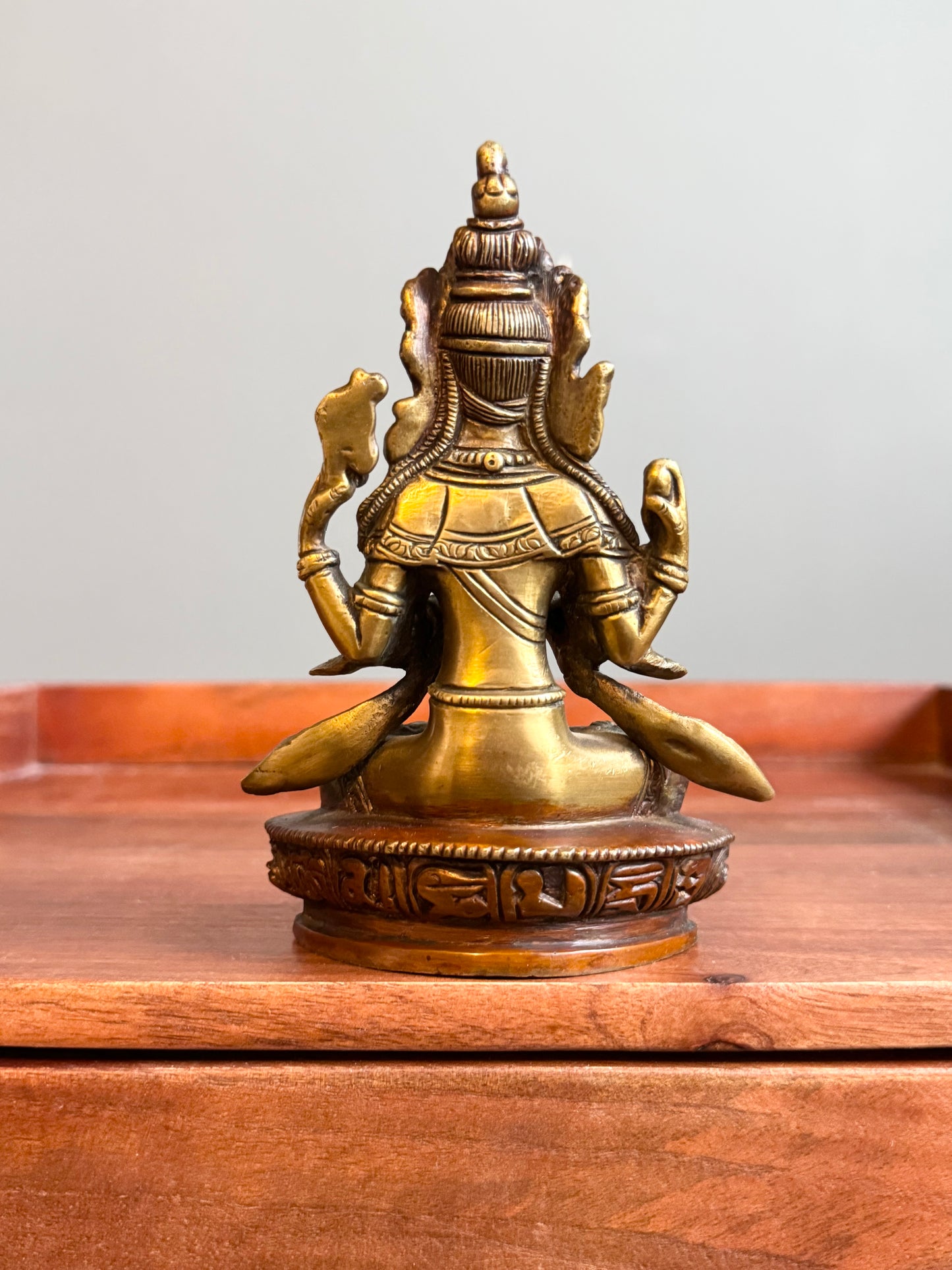 This piece stands out as one of the most intricate I've encountered for its size, truly a Zinnara favourite. Chenrezig, also known as Avalokiteśvara, holds a significant place in Tibetan Buddhism. As a tenth-level bodhisattva, Chenrezig embodies great compassion (mahakaruṇā). He is often associated with Amitabha Buddha. In Tibet, Chenrezig is considered the patron bodhisattva and is even regarded as higher than a bodhisattva—specifically as a Buddha. His meditation is practiced across various Tibetan Buddhi