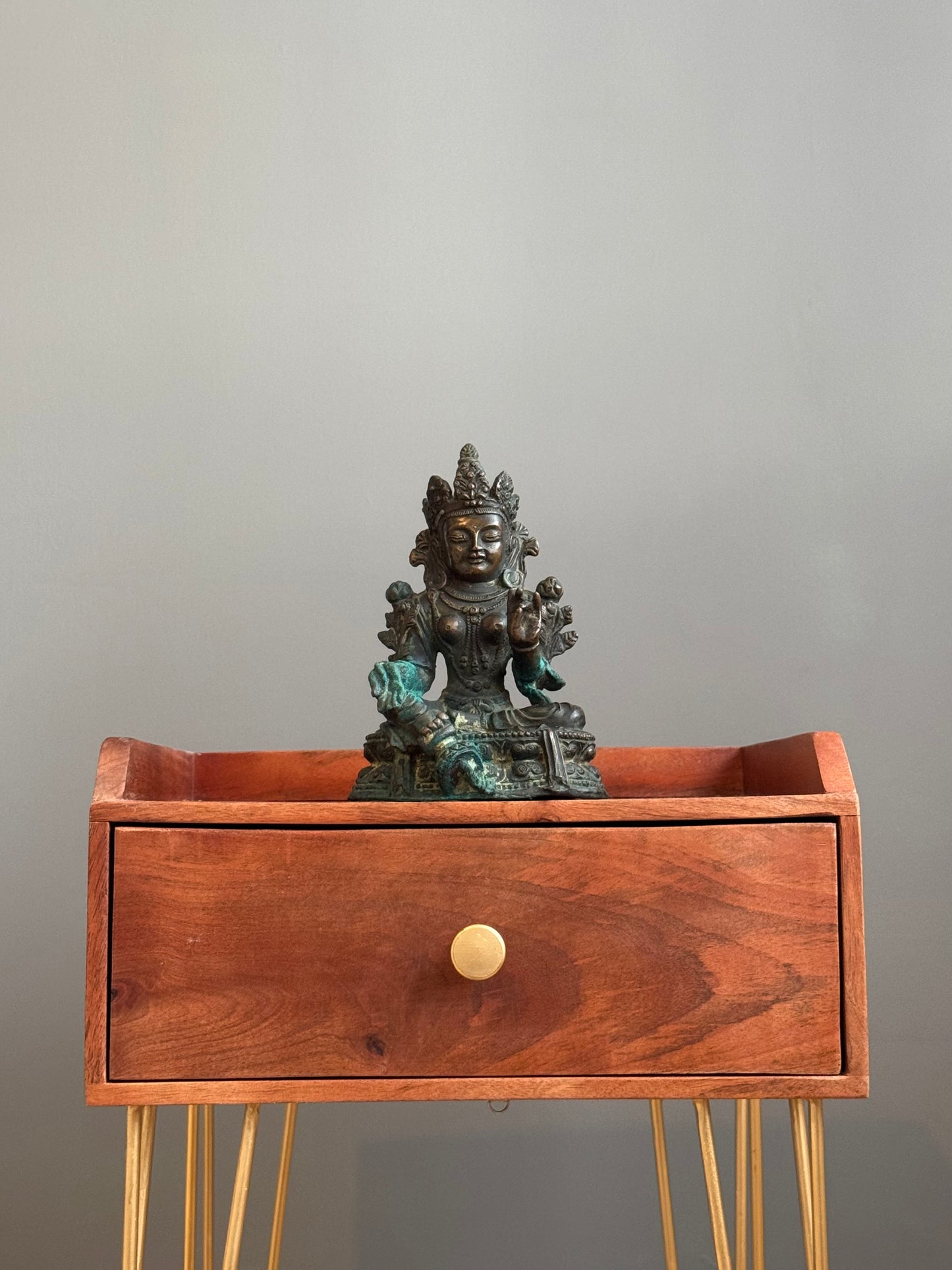 Antique believed to be from the 19th century. A remarkable bronze statue of Tara, the cherished Bodhisattva of Tibetian Buddhism, dating back to the 19th century. Tara is a symbol of compassion and protection, and there is a quiet strenght to her presence that makes this statue truly special. It is in great antique condition and features a beautiful patina thats hard to come by. The attention to detail is impressive, and its clear this was created with care. Tara statues are often treasured for their calmin